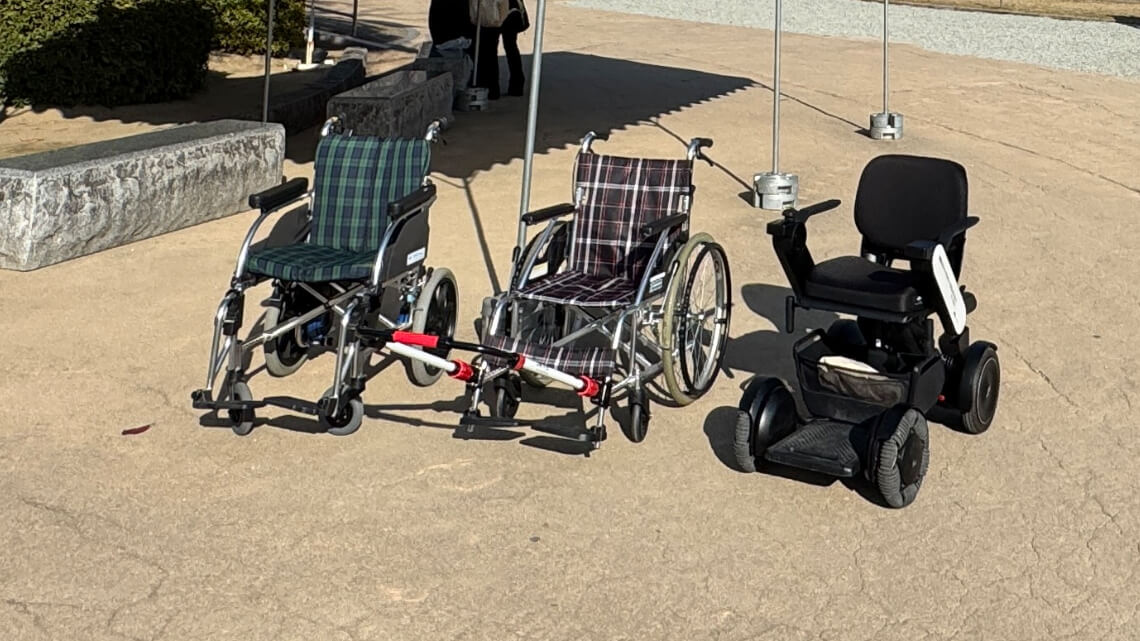 Two manual wheelchairs and a motorized wheelchair, provided by the Himeji Universal Tourism Center.