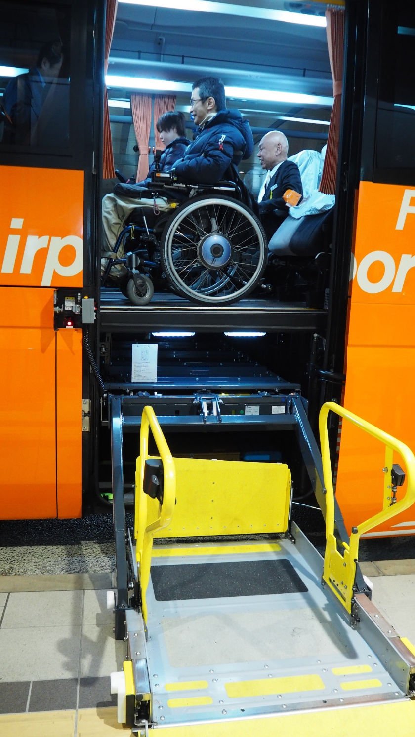 Wheelchair users in accessible airport bus