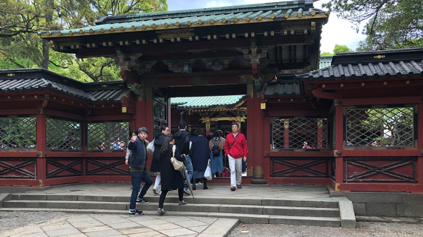 Steps through wall into main shrine at Nezu Jinja