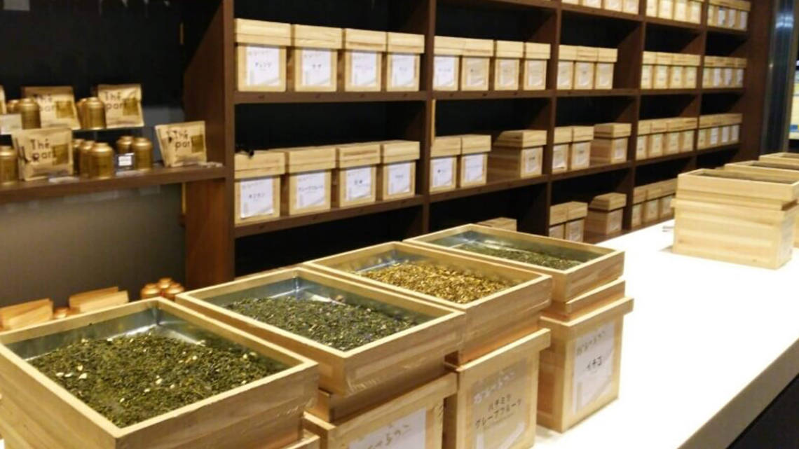 Tea store with dry leaves on display