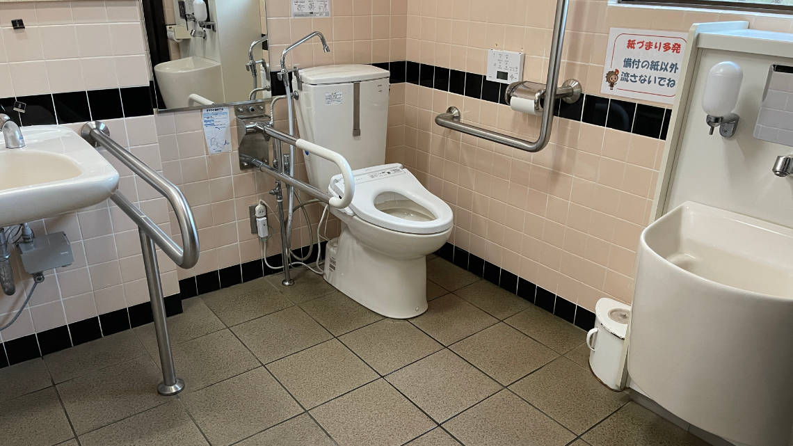 Toilet near parking area 