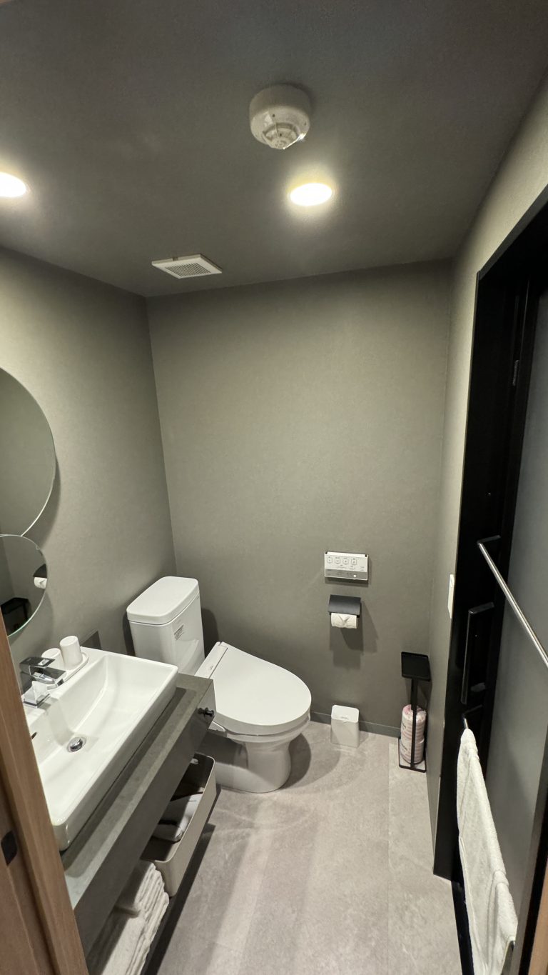 premium two bedroom suite bedroom 1 toilet and shower room 768x1365