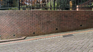 Close-up of a sloped pathway with a noticeable grade.
