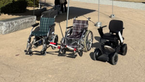 Two manual wheelchairs and a motorized wheelchair, provided by the Himeji Universal Tourism Center.